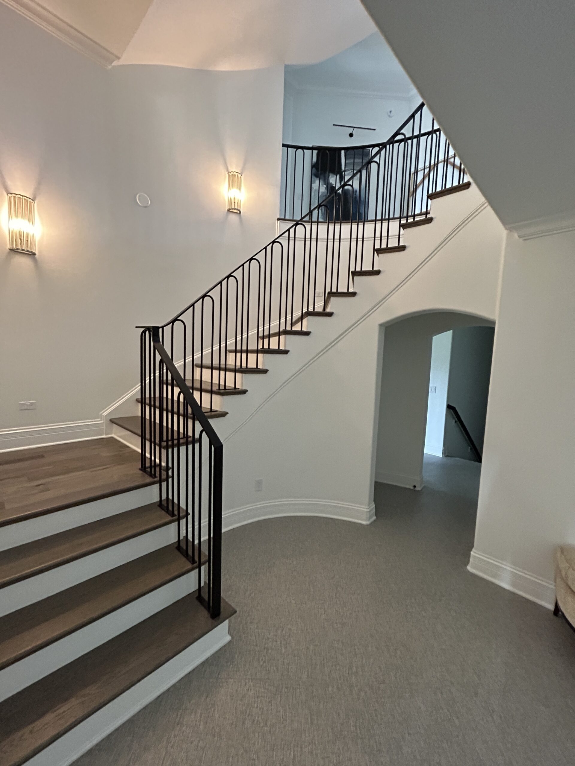 iron stair railing with wide stair treads