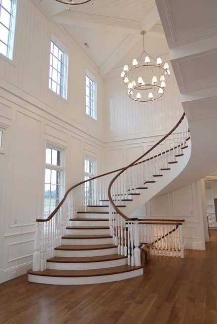 Hendersonville, TN traditional curved modern floating staircase ideas bowed treads, and antique reproduction newels