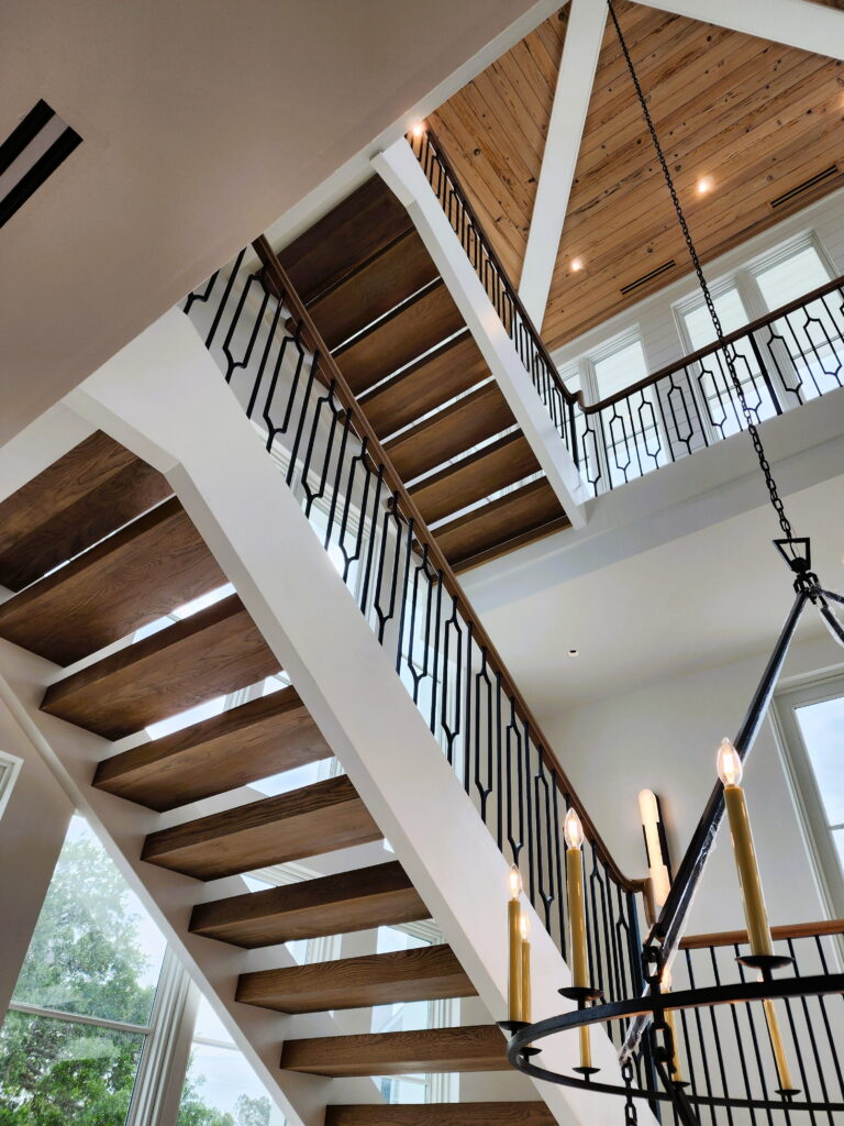 What Luxury Home Builders Should Decide Early for Custom Staircase Design